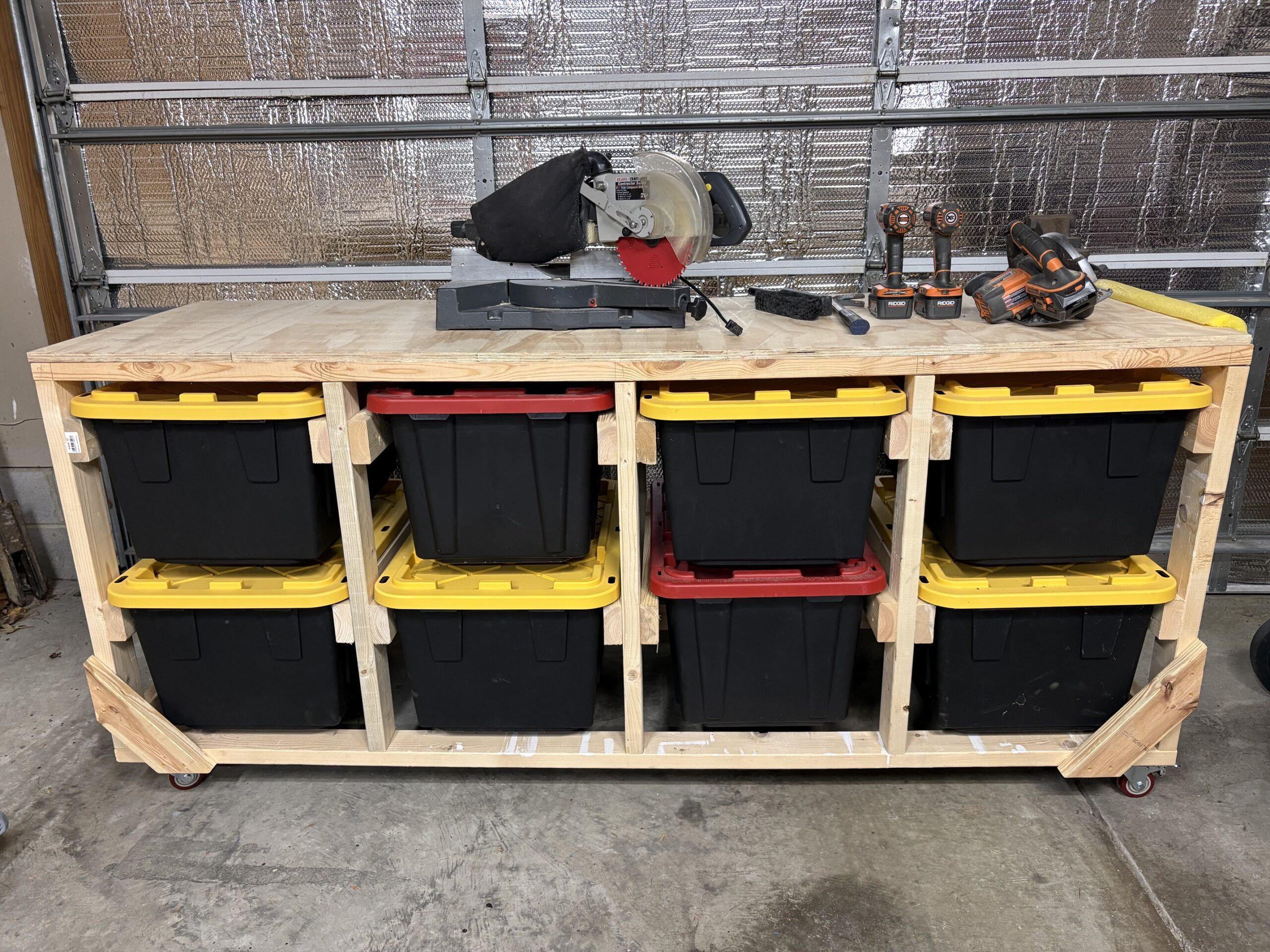 That Shelf Guy custom workbench with workshop top and storage totes